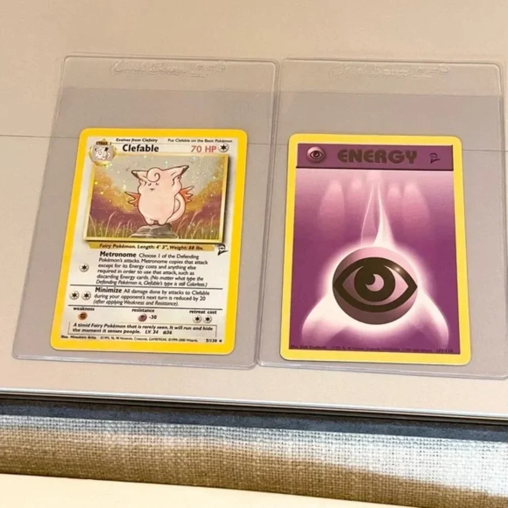 2 cards: Rare Clefable Reverse Holo + purple Psychic Energy. Both Base Set 2